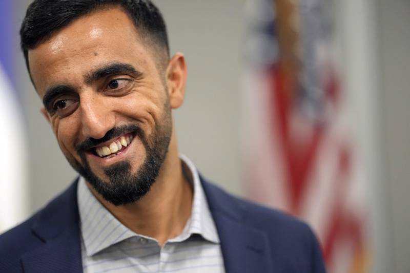Abdul Wasi Safi smiles after a news conference Friday, Jan. 27, 2023, in Houston.